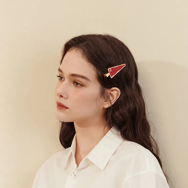 Mora Triangle Pelican Clip - EVITA PERONI OFFICIAL