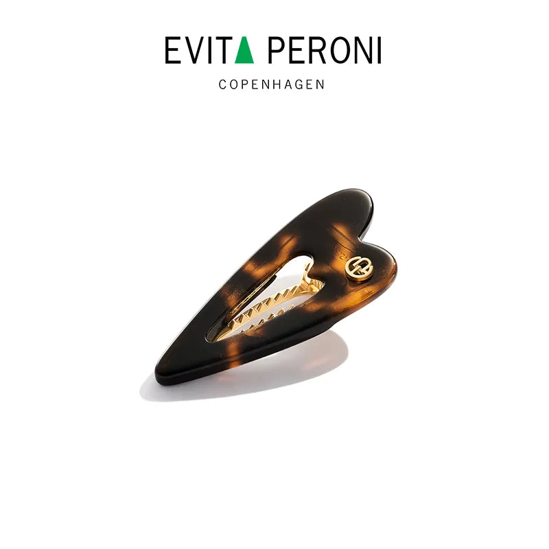 Delilah Heartbeat Pelican Clip - EVITA PERONI OFFICIAL