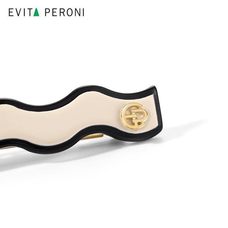 Wavy beige and black hair barrette with gold-tone accent, premium hair accessory