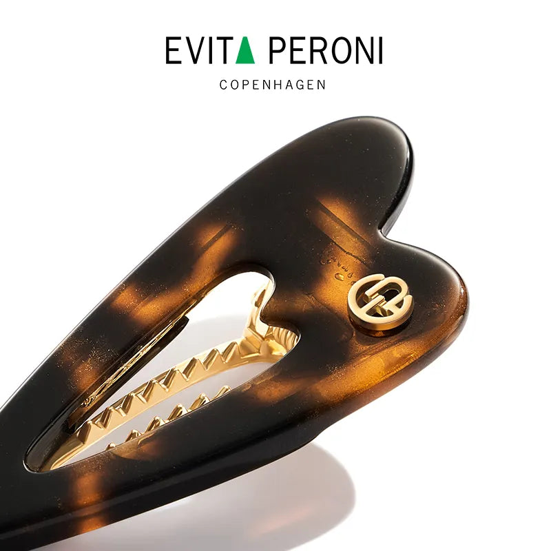 Delilah Heartbeat Pelican Clip - EVITA PERONI OFFICIAL