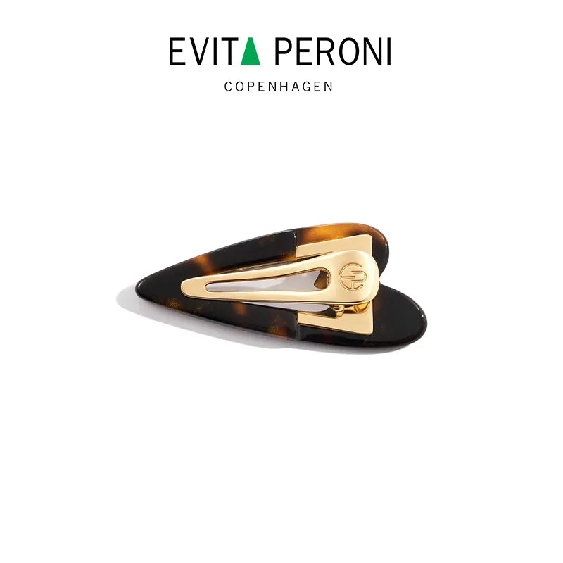 Delilah Heartbeat Pelican Clip - EVITA PERONI OFFICIAL
