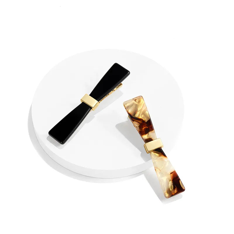 Nicole Bow Style Pelican Hair Clip - EVITA PERONI OFFICIAL